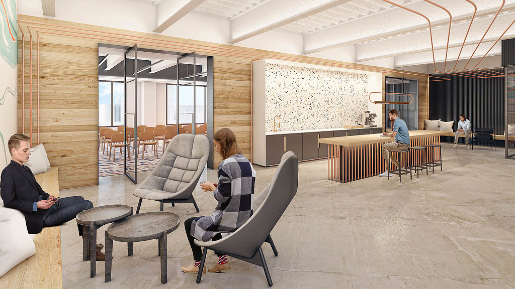 A group of people sitting in chairs.